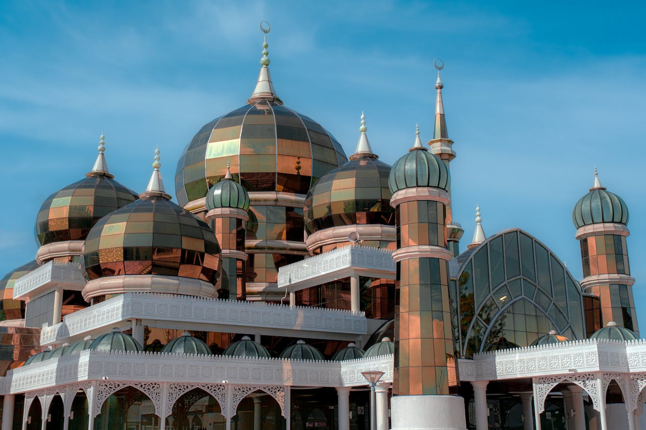 The renowned Crystal Mosque with its intricate domes in Malaysia.